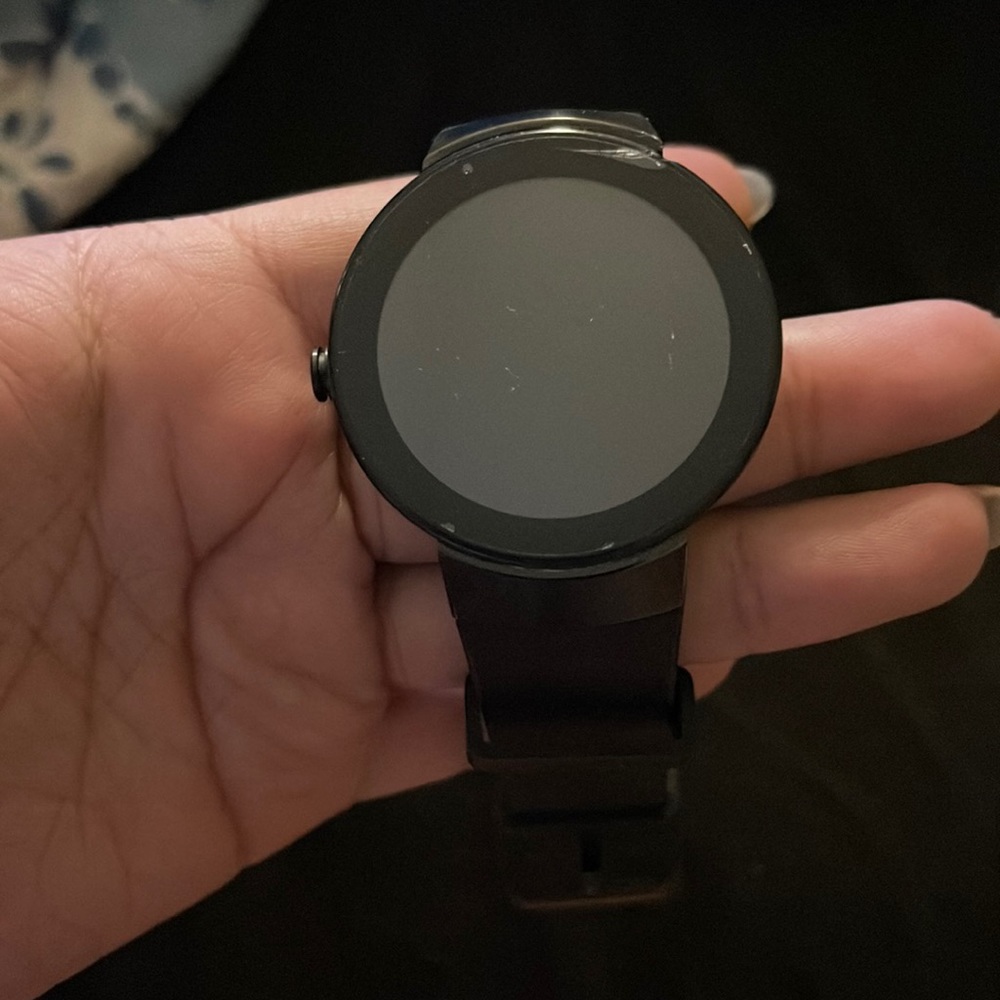 Black Movado Connect. Great for every day wear. Can be unisex.